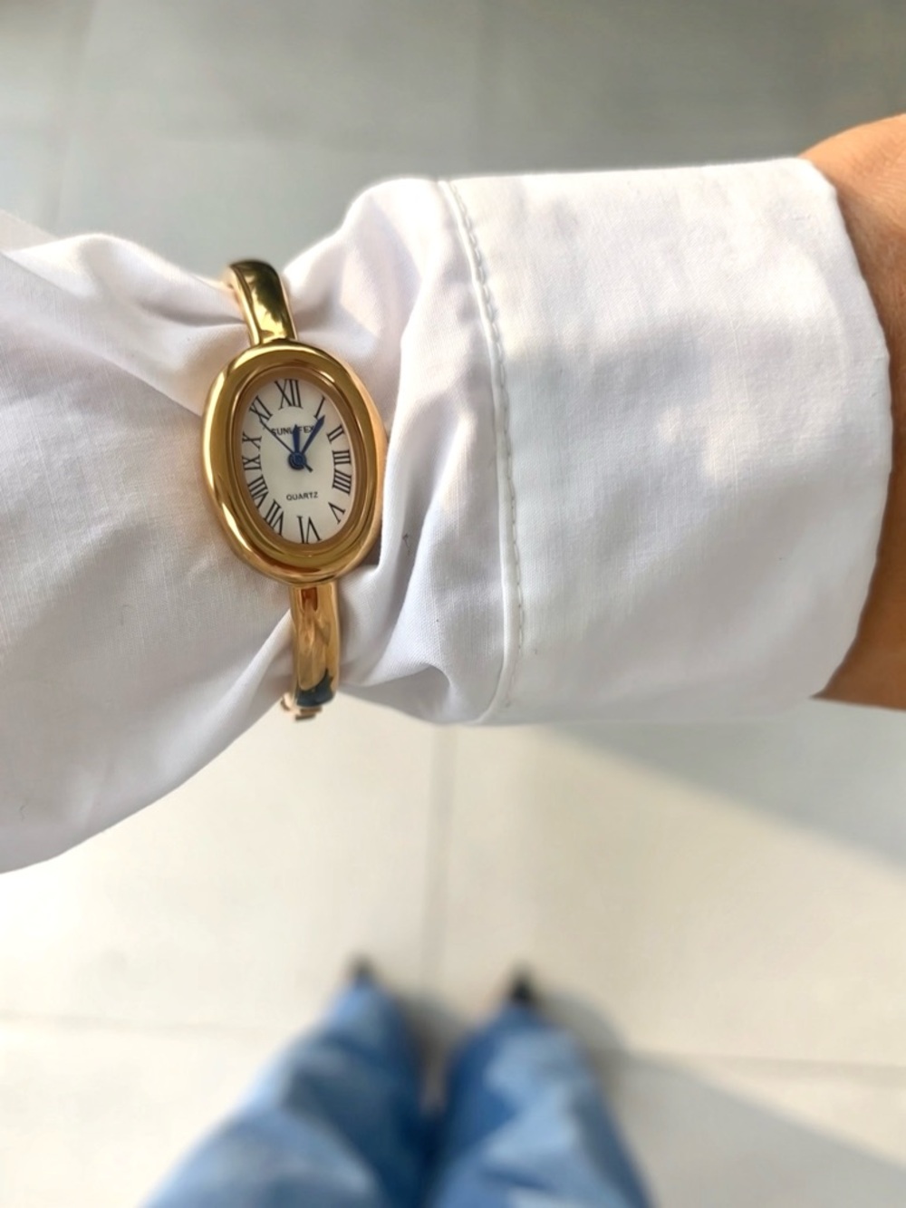 Gold Oval Bangle Watch with White Dial